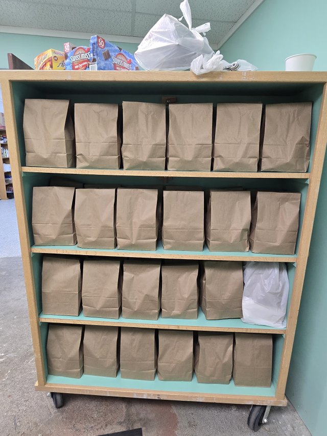 Brown bag lunches prepared for Saturday distribution