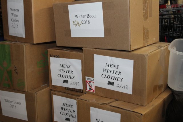Winter clothing boxed for community outreach at Mustard Seed Ministries